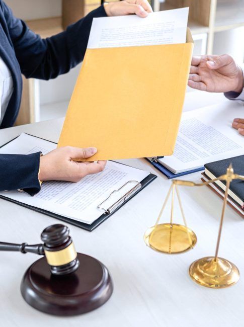 Consultation and conference of female lawyers and professional businesswoman working and discussion having at law firm in office. Concepts of law, Judge gavel with scales of justice.